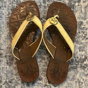Tory Burch Cream and Brown Flip Flops with gold logo  size 6